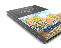 Hardcover book with a European canal street cover