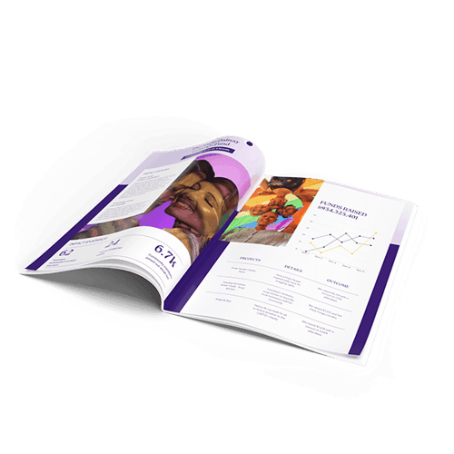 Open nonprofit newsletter with photo and chart spread