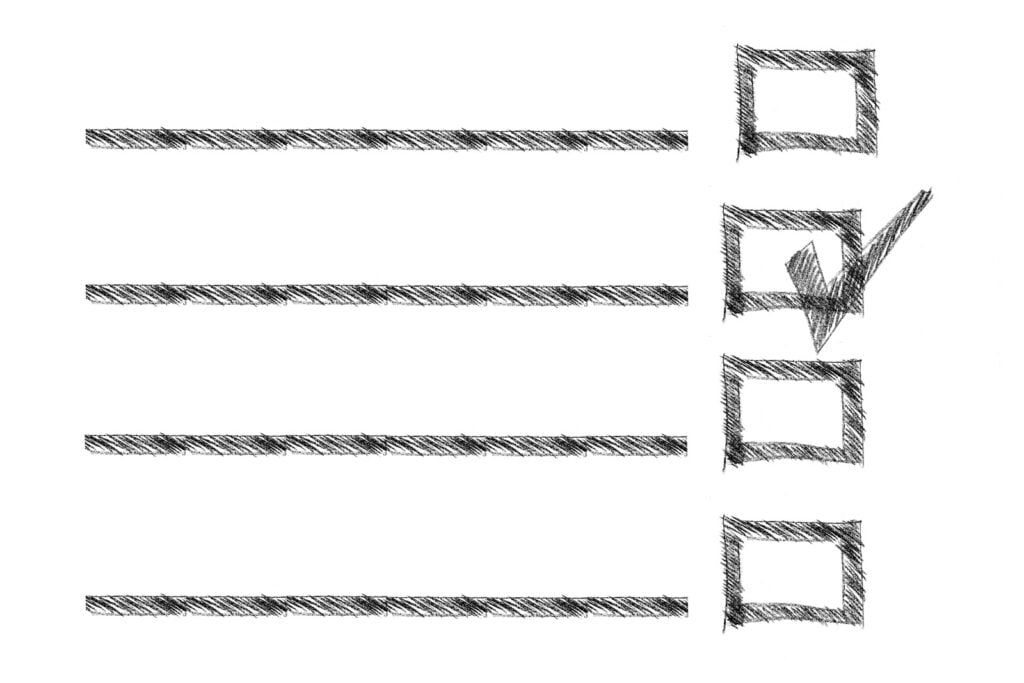 Lines, boxes, and a check mark drawn with scribbles