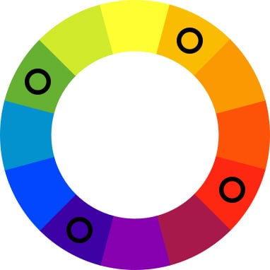 Color wheel with black spots on green, orange, violet, and red