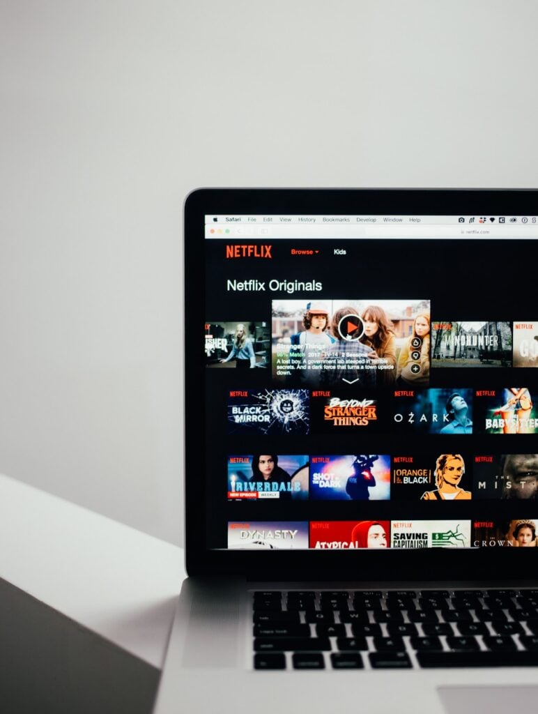 Netflix.com homepage on a laptop