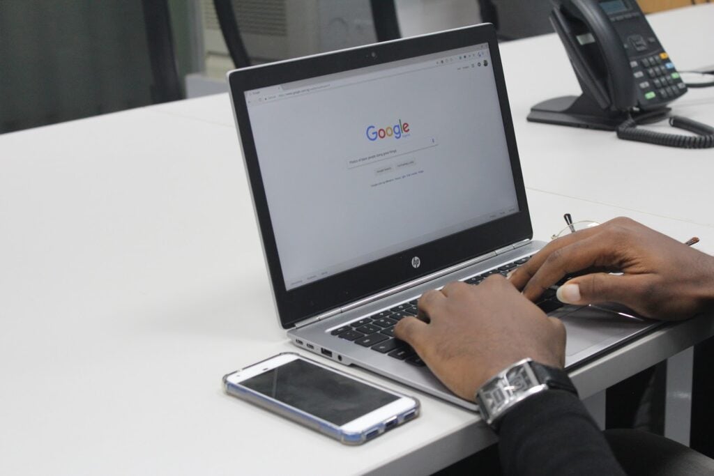 A person looking up local marketing on Google