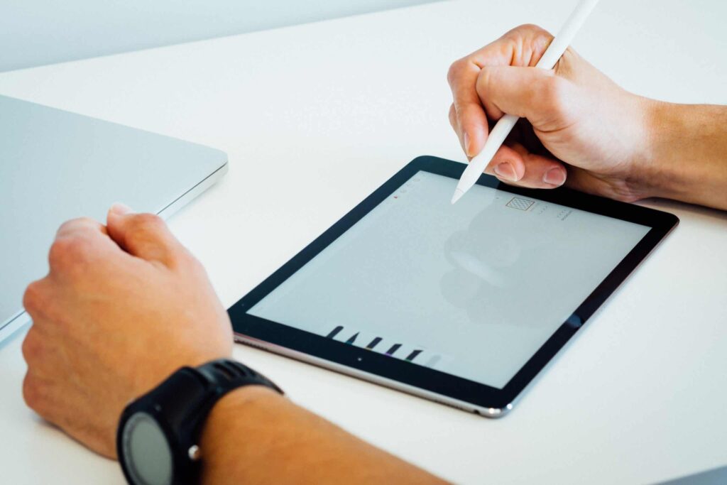 Someone designing on an iPad