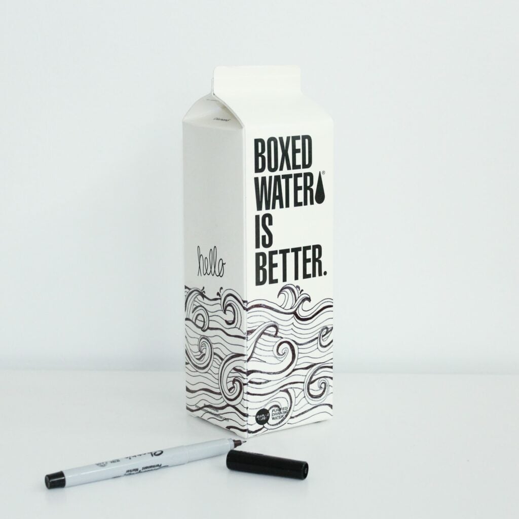 White carton with black lettering and wave design