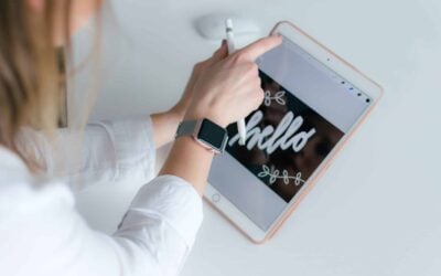 person drawing on their iPad