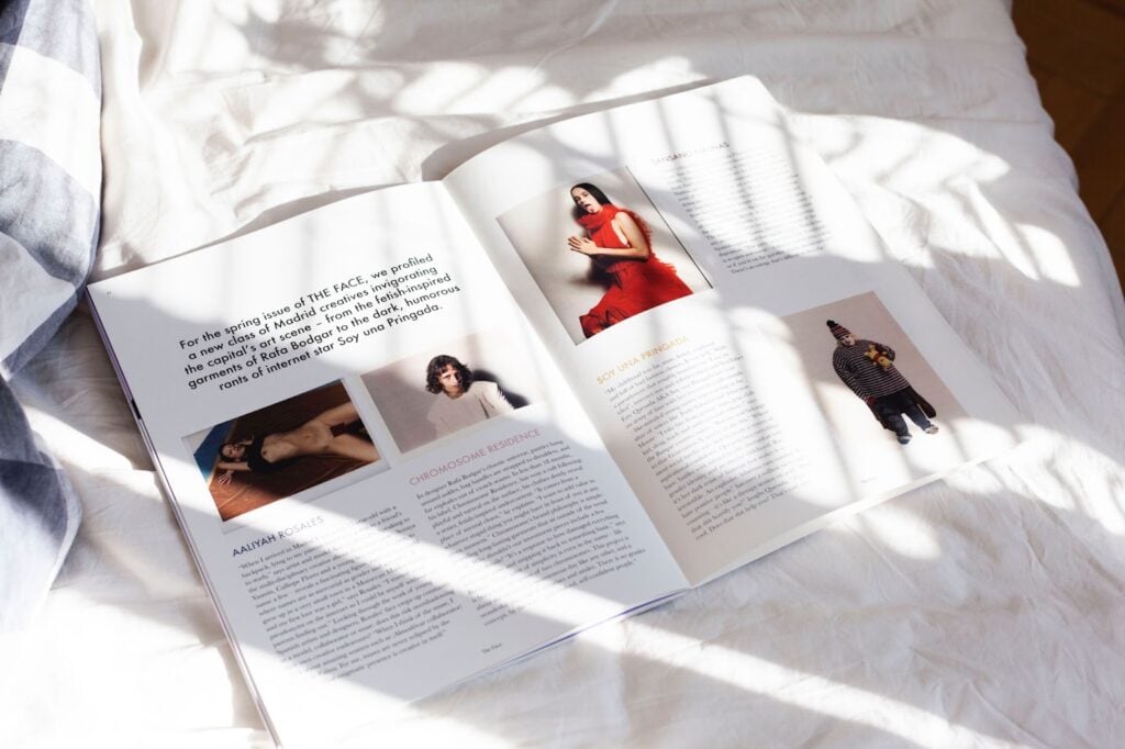 open lookbook on a bed