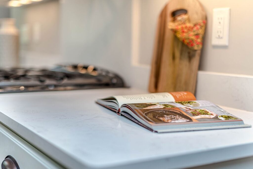 Hardcover book laying open on a counter