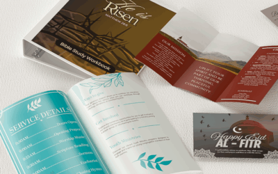 Church program binding options on white surface