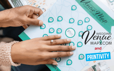 hands holding a wedding venue map printed program