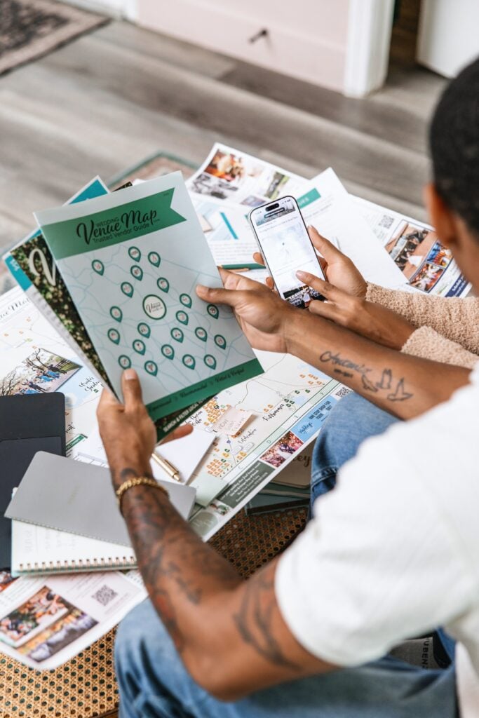 A Couple looking through printed